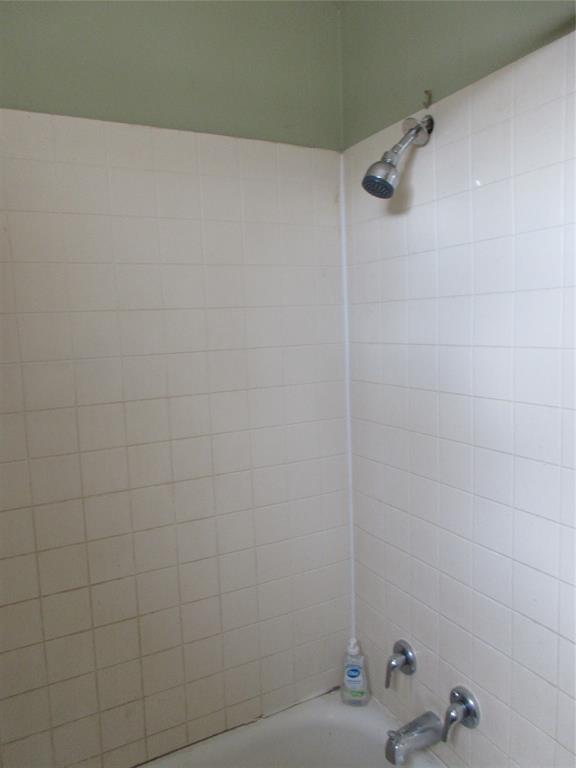 916 Ward Street Marlin, TX 76661 - Photo 11 of 13 a bathroom with a sink and a shower