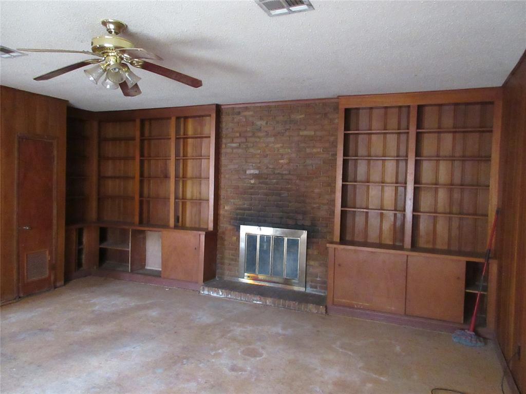 916 Ward Street Marlin, TX 76661 - Photo 3 of 13 a view of an empty room with a window