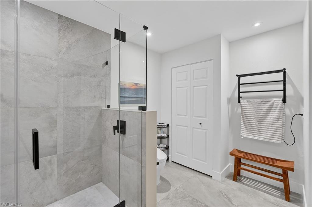175 Palm River Boulevard Naples, FL 34110 - Photo 31 of 45 a bathroom with a shower