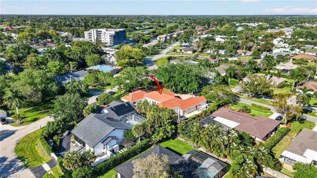 175 Palm River Boulevard Naples, FL 34110 - Photo 38 of 45 an aerial view of residential houses with outdoor space