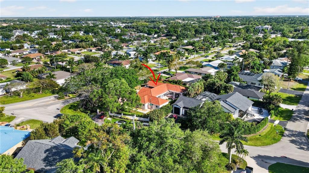 175 Palm River Boulevard Naples, FL 34110 - Photo 39 of 45 an aerial view of residential houses with outdoor space and trees