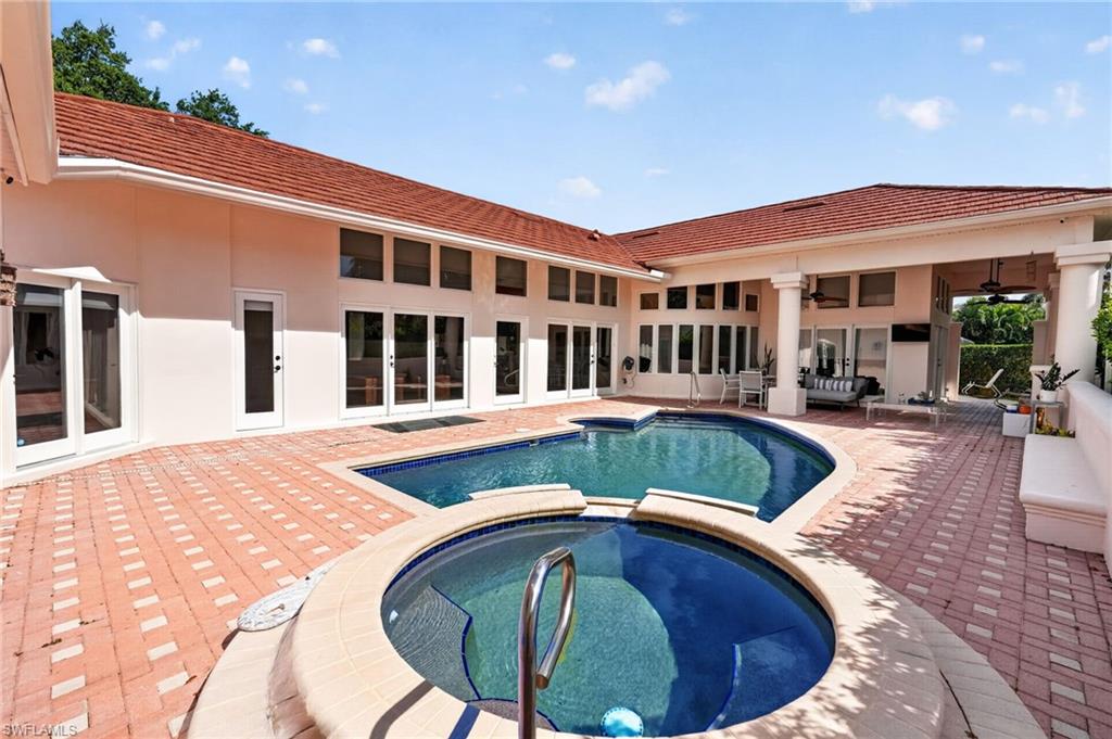 175 Palm River Boulevard Naples, FL 34110 - Photo 43 of 45 a house view with a outdoor space