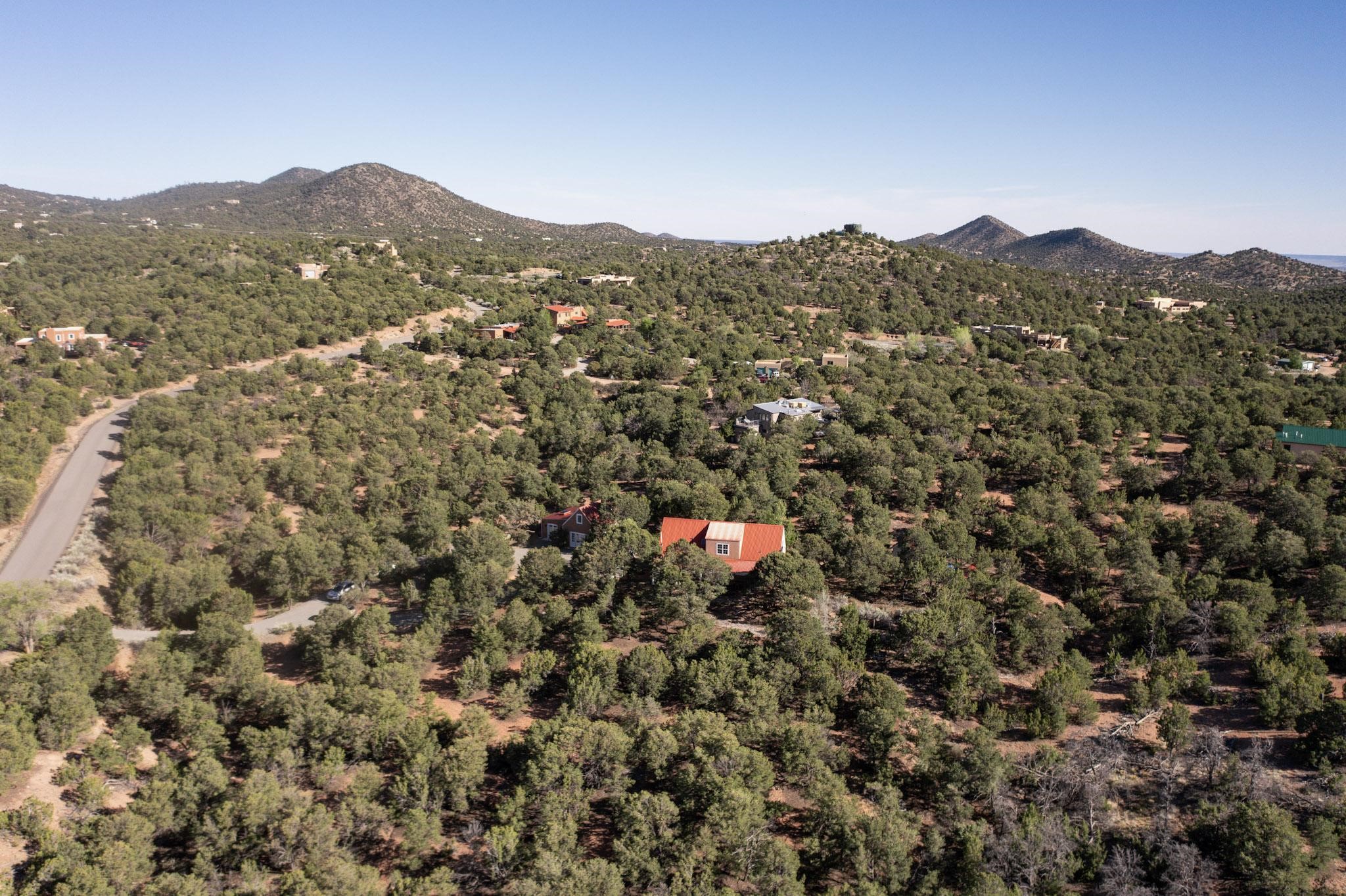 15 Toltec Road Santa Fe, NM 87505 - Photo 66 of 72 Aerial with Toltec Rd.
(The Toltec culture was a pre-Columbian Mesoamerican culture that ruled a state centered in Tula, Hidalgo, Mexico, during the Epiclassic and the early Post-Classic period of Mesoamerican chronology, reaching prominence from 950 to 1150 CE before thw Aztec)