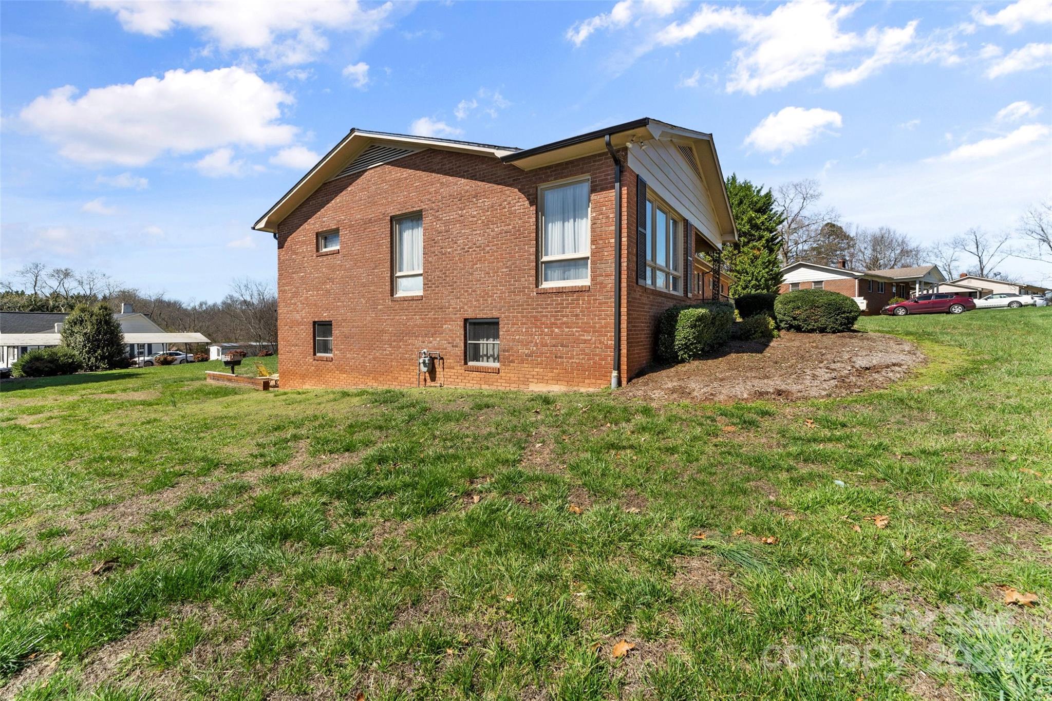 110 Stephens Drive Morganton, NC 28655 - Photo 25 of 29 a front view of a house with garden
