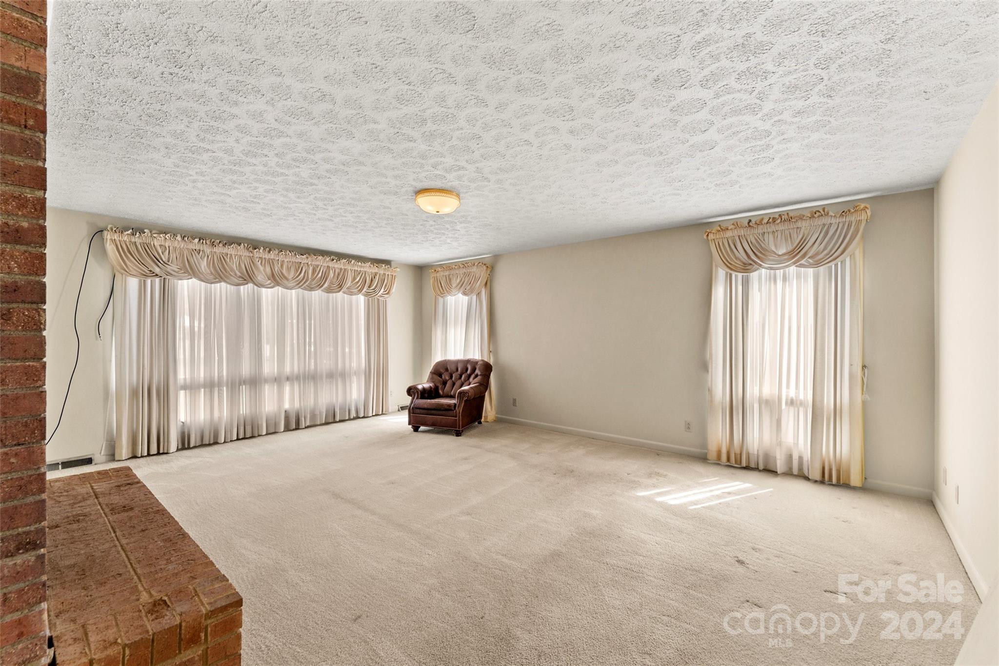 110 Stephens Drive Morganton, NC 28655 - Photo 10 of 29 a view of a livingroom with a rug