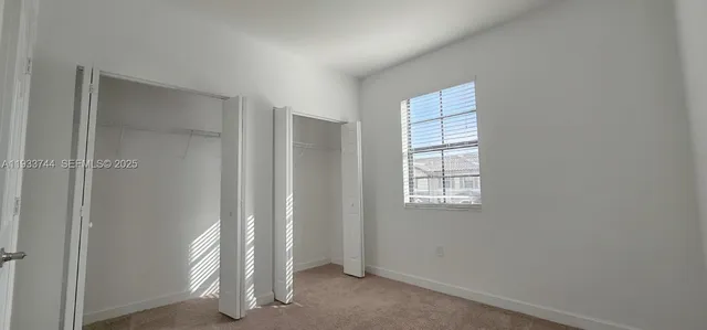 a view of an empty room with window