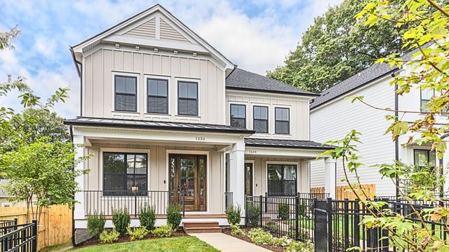 a front view of a house with glass windows