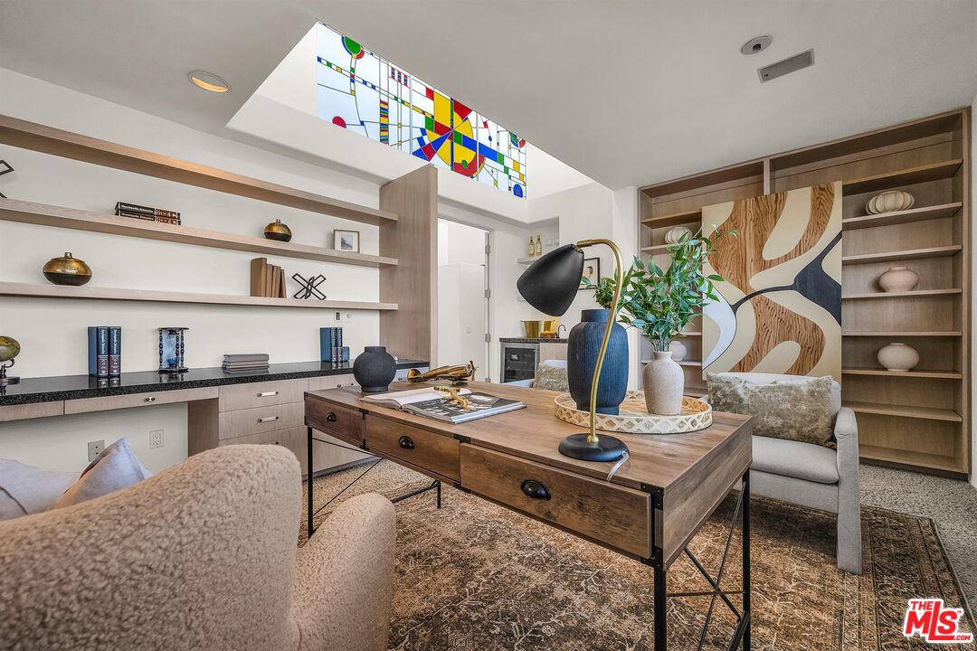 4911 Roma Court Marina del Rey, CA 90292 - Photo 36 of 58 a living room with furniture and wooden floor