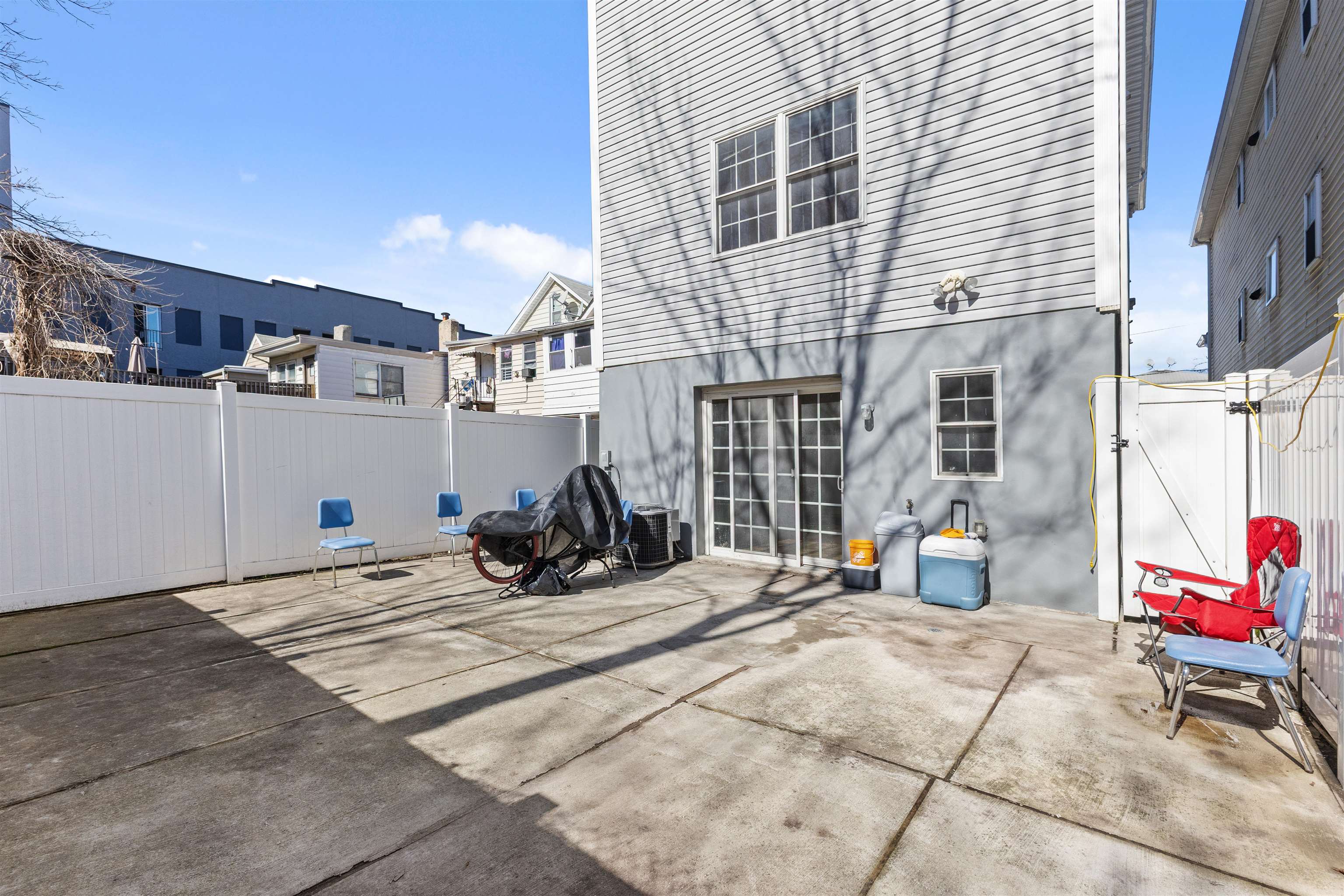 23 Reynolds Avenue, Unit 1 Harrison, NJ 07029 - Photo 23 of 23 a view of a lounge chairs in the back yard of the building