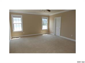 401 Third Baxter Street Fort Mill, SC 29708 - Photo 11 of 16 a open hall with a lot of white walls