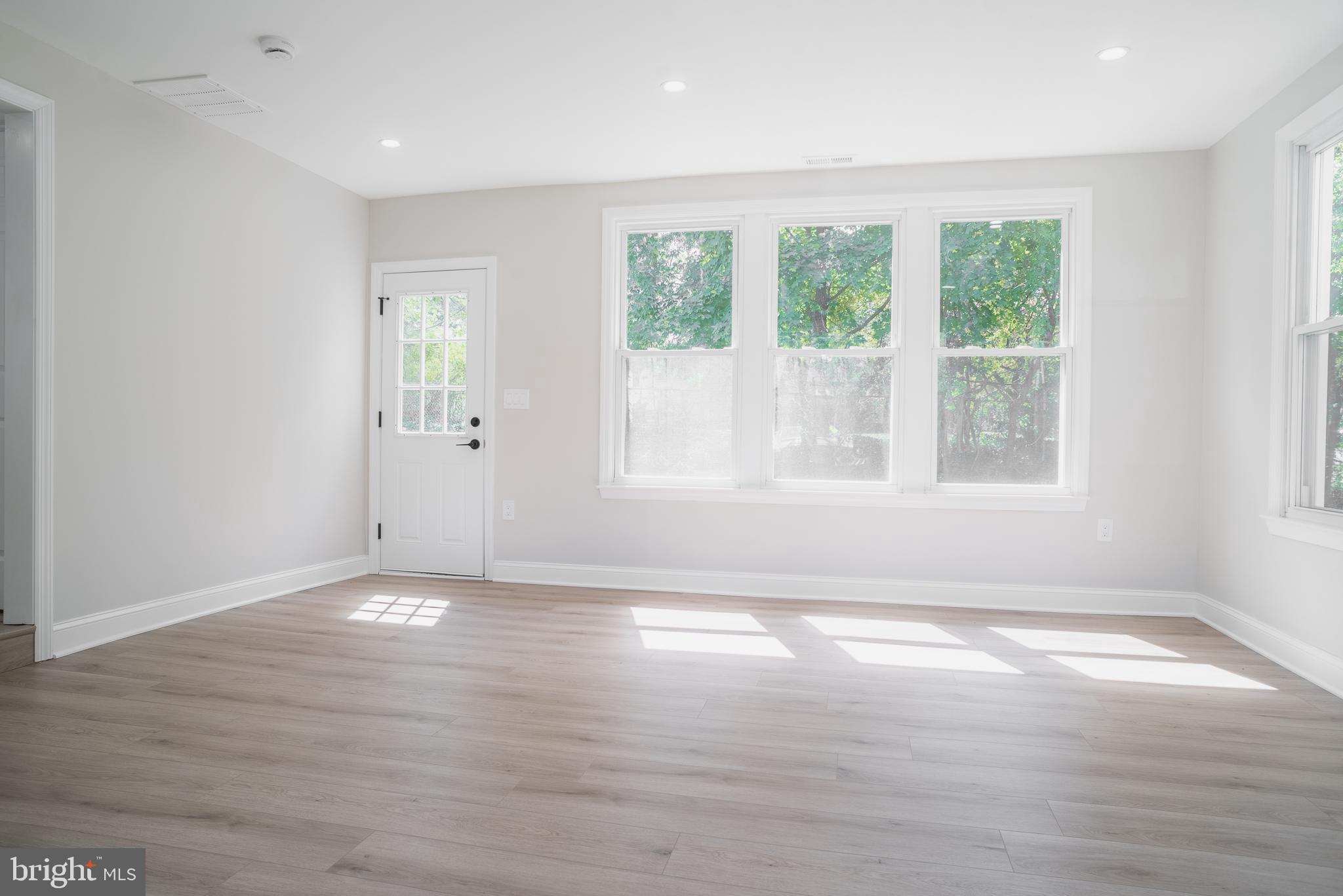 524 West Main Street Maple Shade, NJ 08052 - Photo 14 of 30 an empty room with wooden floor and windows