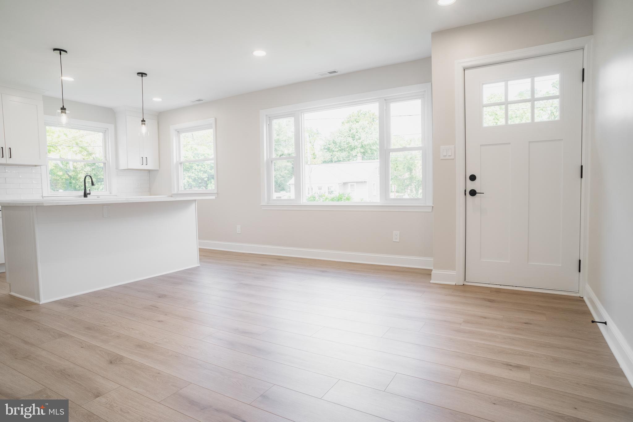 524 West Main Street Maple Shade, NJ 08052 - Photo 5 of 30 a view of an empty room with wooden floor and a window