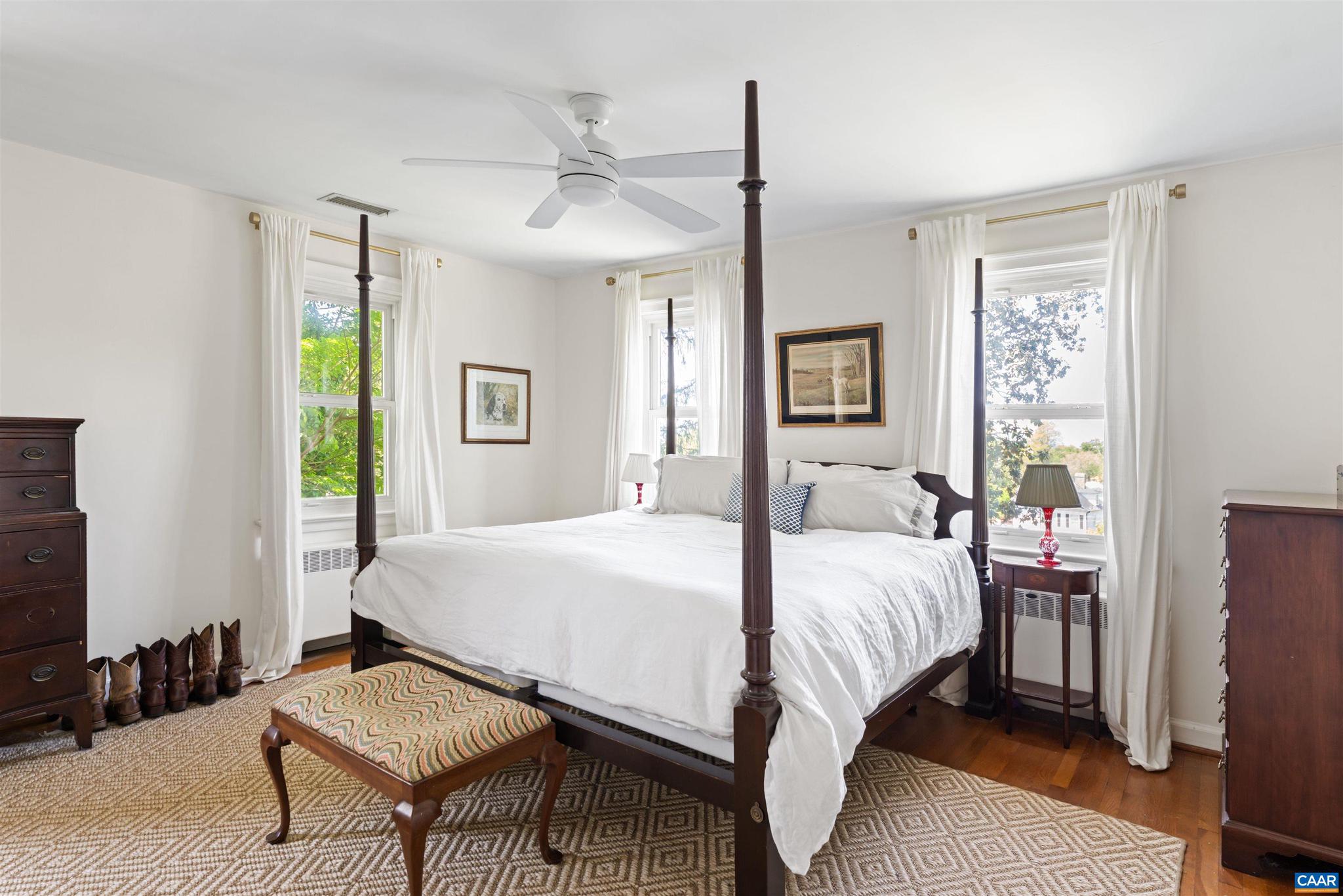 261 Blue Ridge Drive Orange, VA 22960 - Photo 26 of 52 a bed room with a bed and a chandelier
