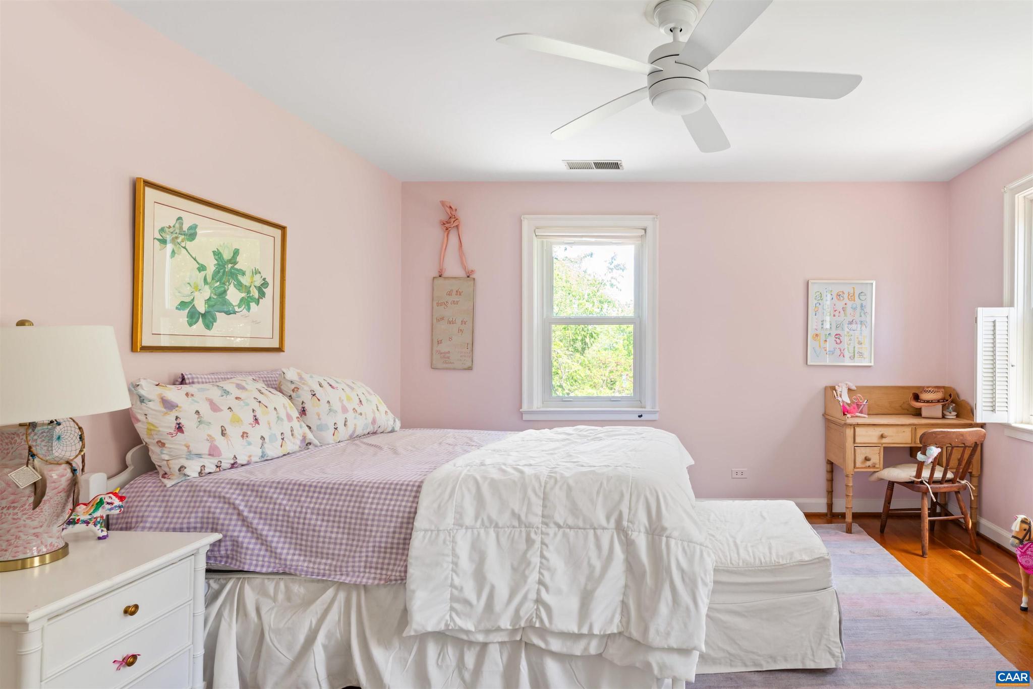 261 Blue Ridge Drive Orange, VA 22960 - Photo 33 of 52 a bedroom with a bed and wooden floor
