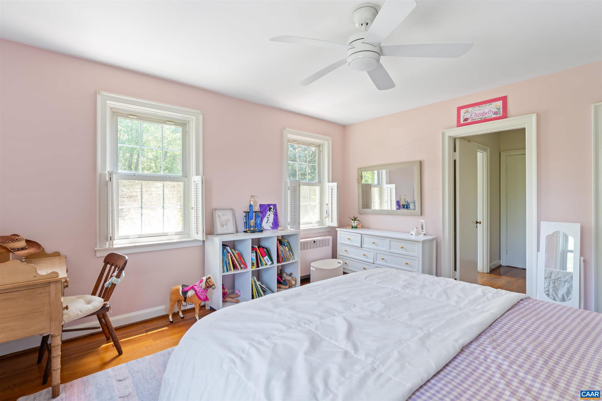 261 Blue Ridge Drive Orange, VA 22960 - Photo 34 of 52 a bedroom with a bed and a chair