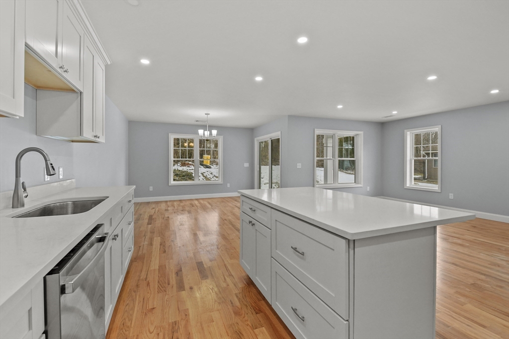 118 Thompson Road, Unit A Webster, MA 01570 - Photo 12 of 39 a spacious bathroom with a sink and a mirror