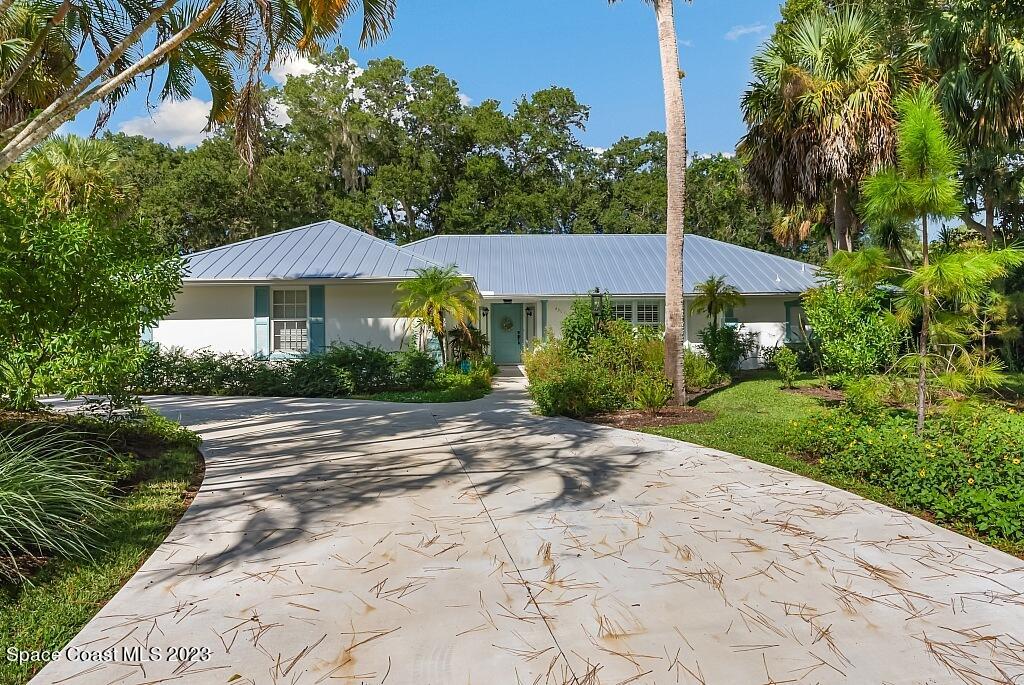 4307 2nd Square Southwest Vero Beach, FL 32968 - Photo 27 of 46 a view of a street with a small yard