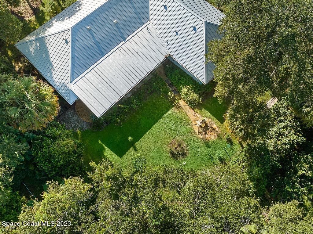 4307 2nd Square Southwest Vero Beach, FL 32968 - Photo 4 of 46 a view of a yard in a backyard