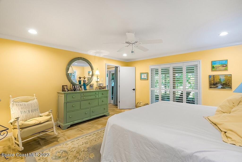 4307 2nd Square Southwest Vero Beach, FL 32968 - Photo 8 of 46 a bedroom with a bed and a dresser