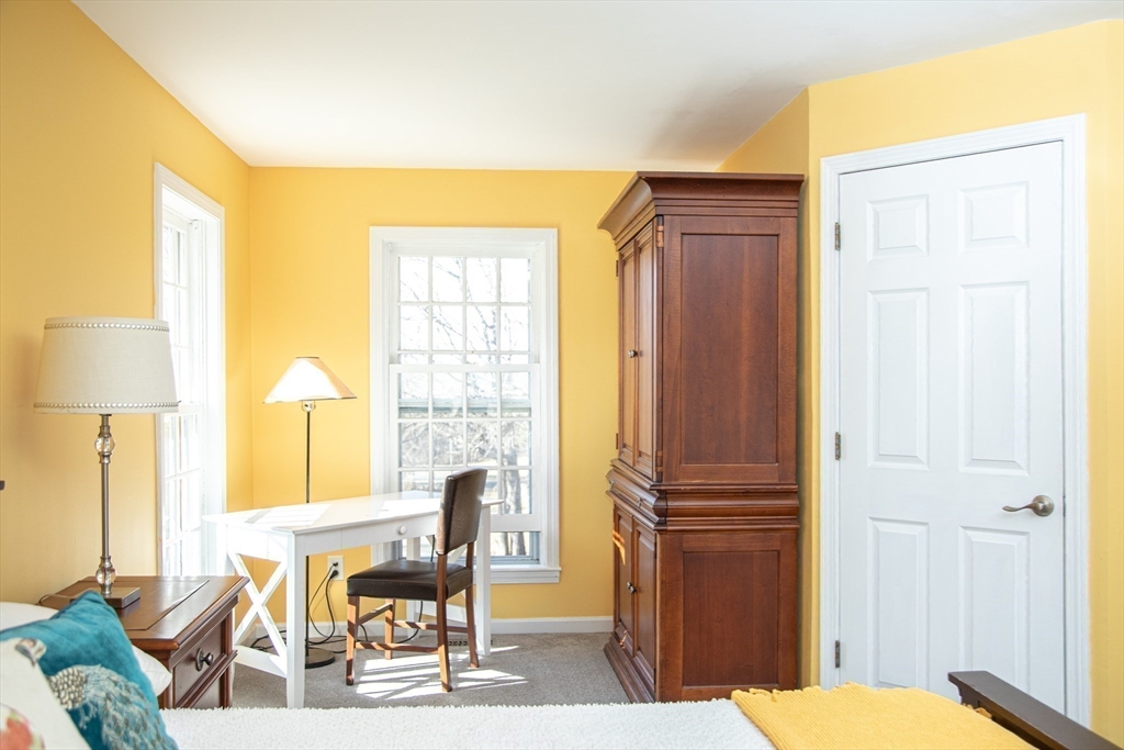 435 Market Hill Road Amherst, MA 01002 - Photo 19 of 42 a view of a dining room with furniture window and outside view