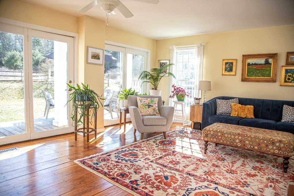 435 Market Hill Road Amherst, MA 01002 - Photo 5 of 42 a living room with furniture and a large window