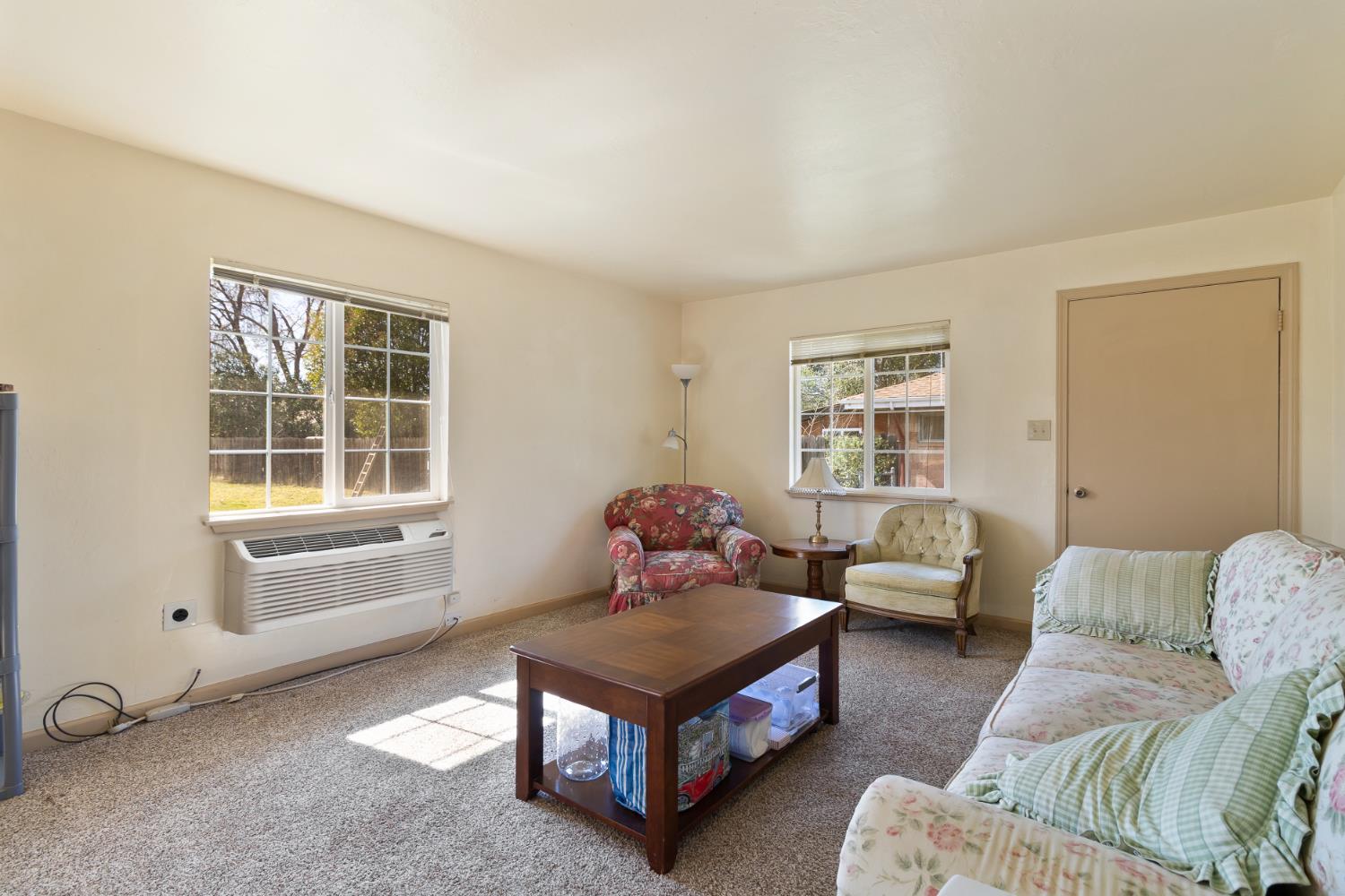 504 West Marlette Street Ione, CA 95640 - Photo 13 of 53 a living room with furniture and a window