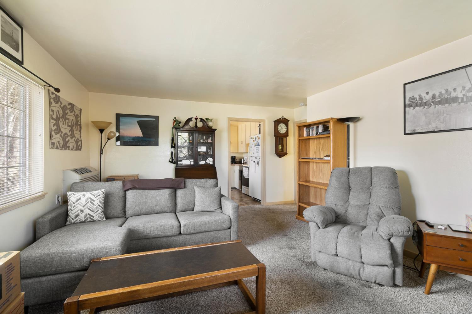 504 West Marlette Street Ione, CA 95640 - Photo 31 of 53 a living room with furniture and a large window