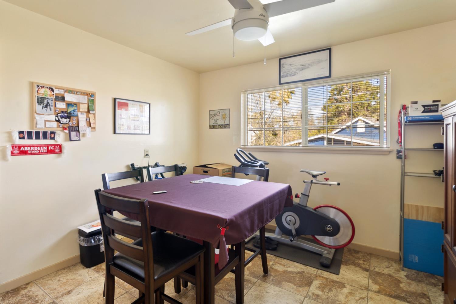 504 West Marlette Street Ione, CA 95640 - Photo 34 of 53 a view of a dining room with furniture window and wooden floor