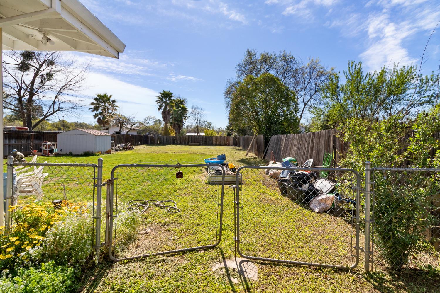 504 West Marlette Street Ione, CA 95640 - Photo 44 of 53 a view of a patio with table and chairs and potted plants
