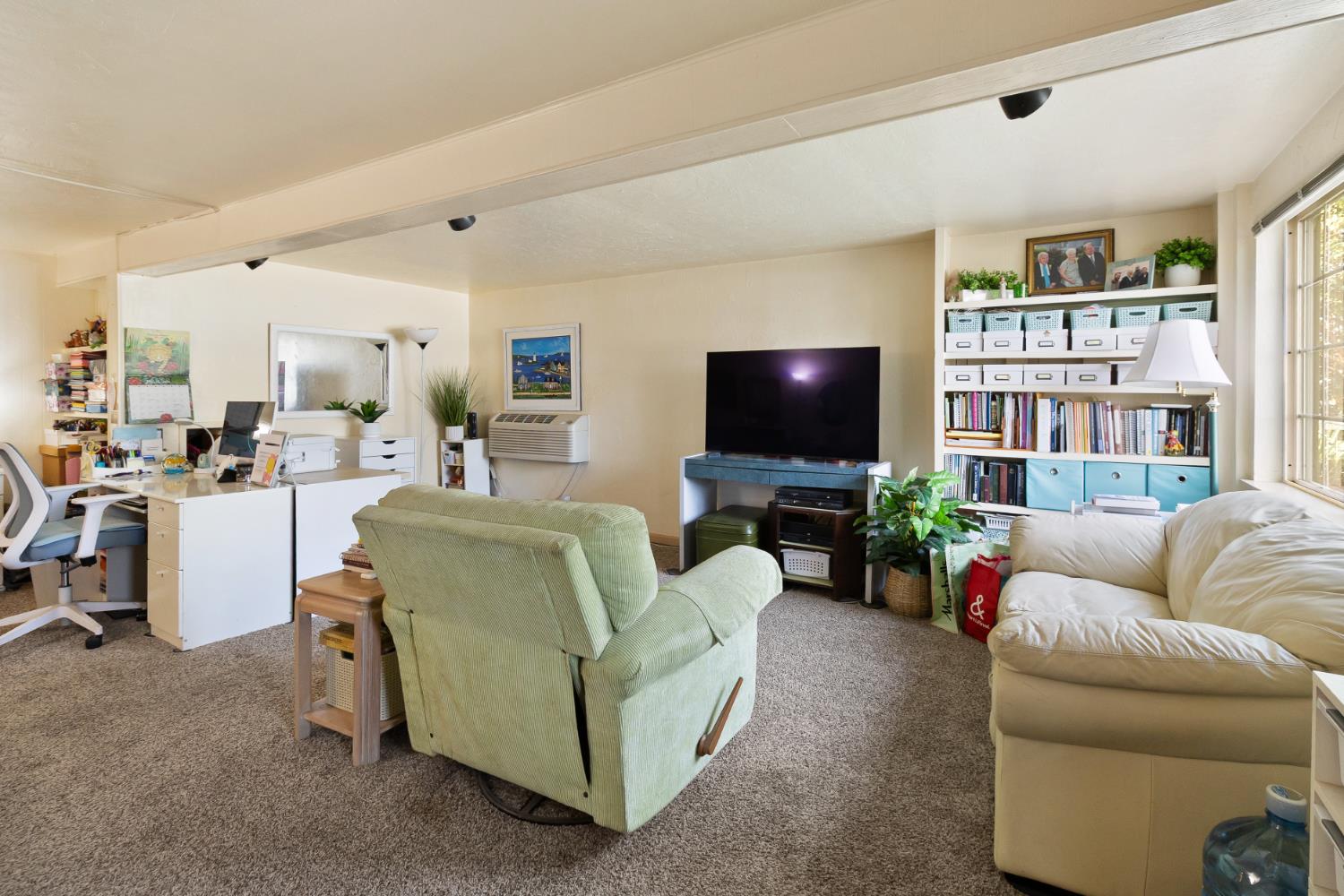 504 West Marlette Street Ione, CA 95640 - Photo 5 of 53 a living room with furniture and a flat screen tv