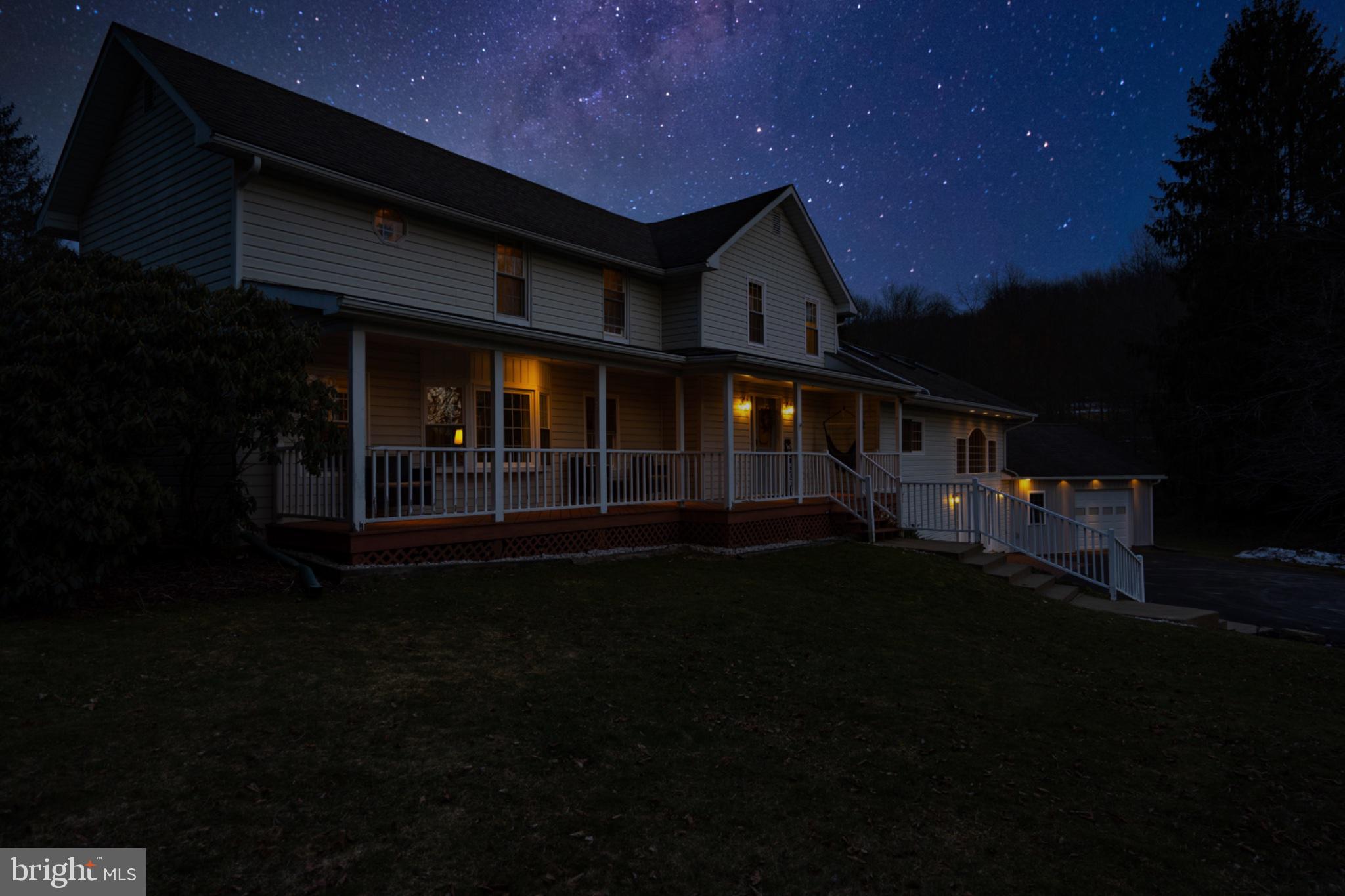 Charming home under a starlit sky.