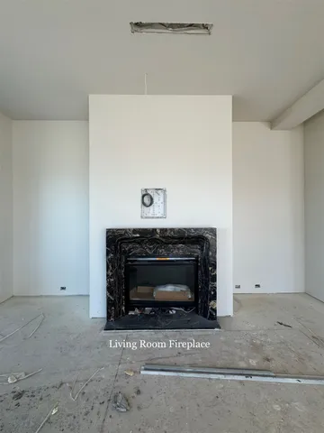 a living room with a fireplace