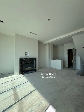 a living room with a fireplace