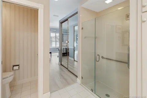 a bathroom with a bathtub and shower