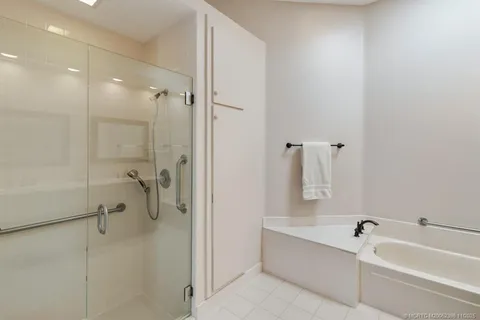 a view of a hallway with closet and entryway