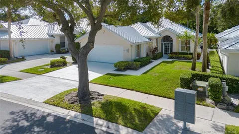 an aerial view of a city with lake view