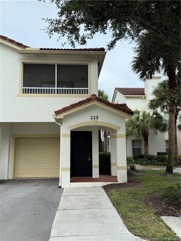 225 Southeast Kitching Circle Stuart, FL 34994 - Photo 11 of 24 a house with a outdoor space