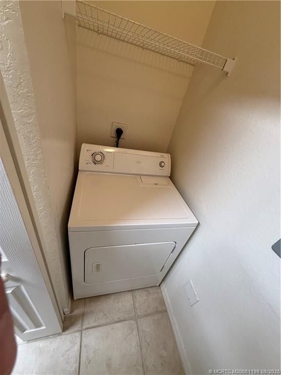 225 Southeast Kitching Circle Stuart, FL 34994 - Photo 17 of 24 a utility room with dryer and washer