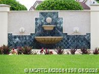 225 Southeast Kitching Circle Stuart, FL 34994 - Photo 2 of 24 a bird view of a house with a yard