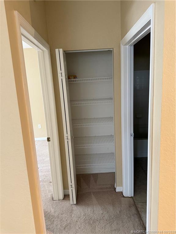 225 Southeast Kitching Circle Stuart, FL 34994 - Photo 21 of 24 a view of walk in closet