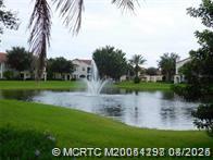 225 Southeast Kitching Circle Stuart, FL 34994 - Photo 6 of 24 a view of a lake