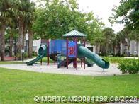 225 Southeast Kitching Circle Stuart, FL 34994 - Photo 9 of 24 a view of a park with slide