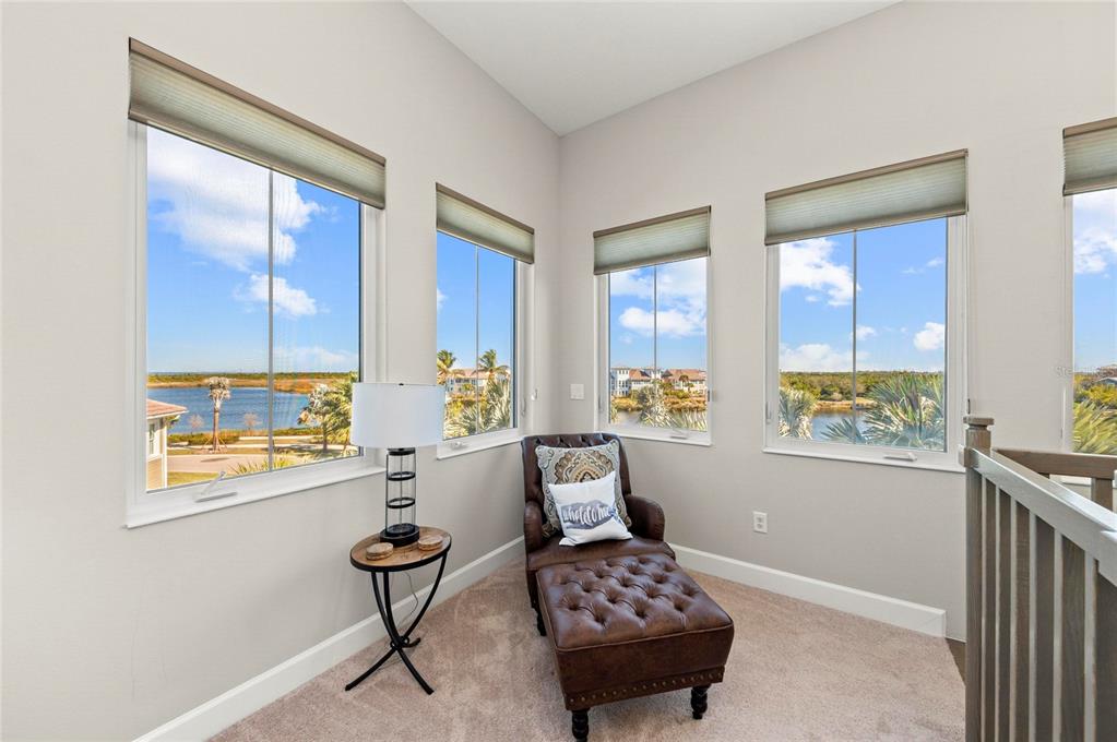 295 Compass Point Drive, Unit 202 Bradenton, FL 34209 - Photo 32 of 100 a bedroom with furniture and a window