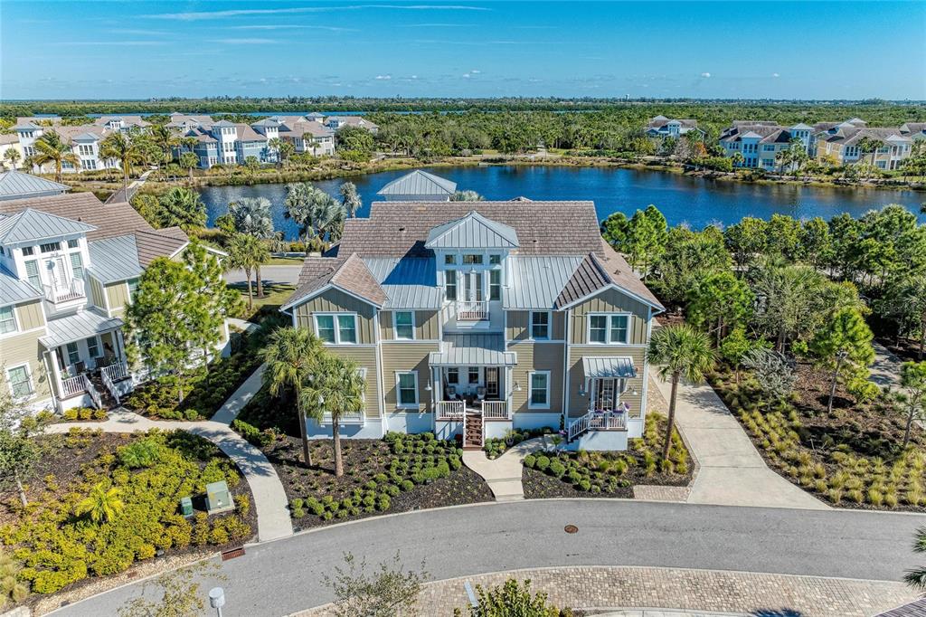 295 Compass Point Drive, Unit 202 Bradenton, FL 34209 - Photo 5 of 100 an aerial view of multiple house