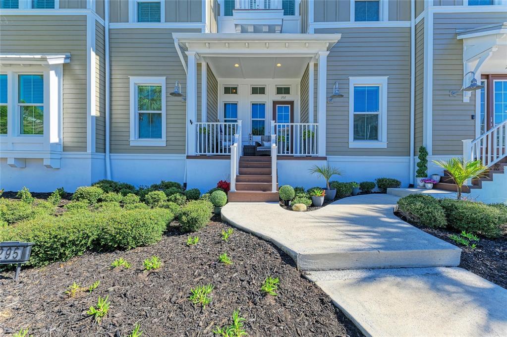 295 Compass Point Drive, Unit 202 Bradenton, FL 34209 - Photo 7 of 100 a front view of a house