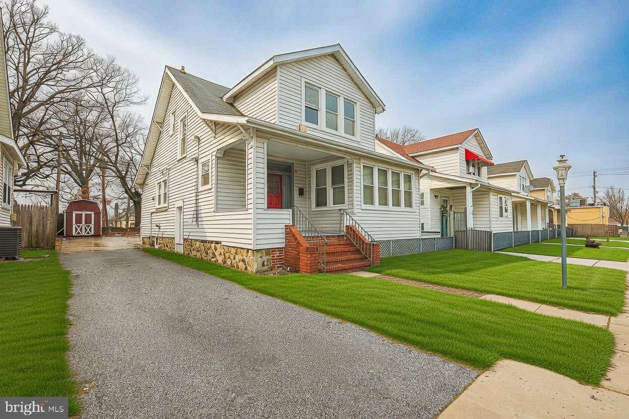 8 Irving Place Baltimore, MD 21208 - Photo 1 of 25 Charming home with inviting porch and driveway.