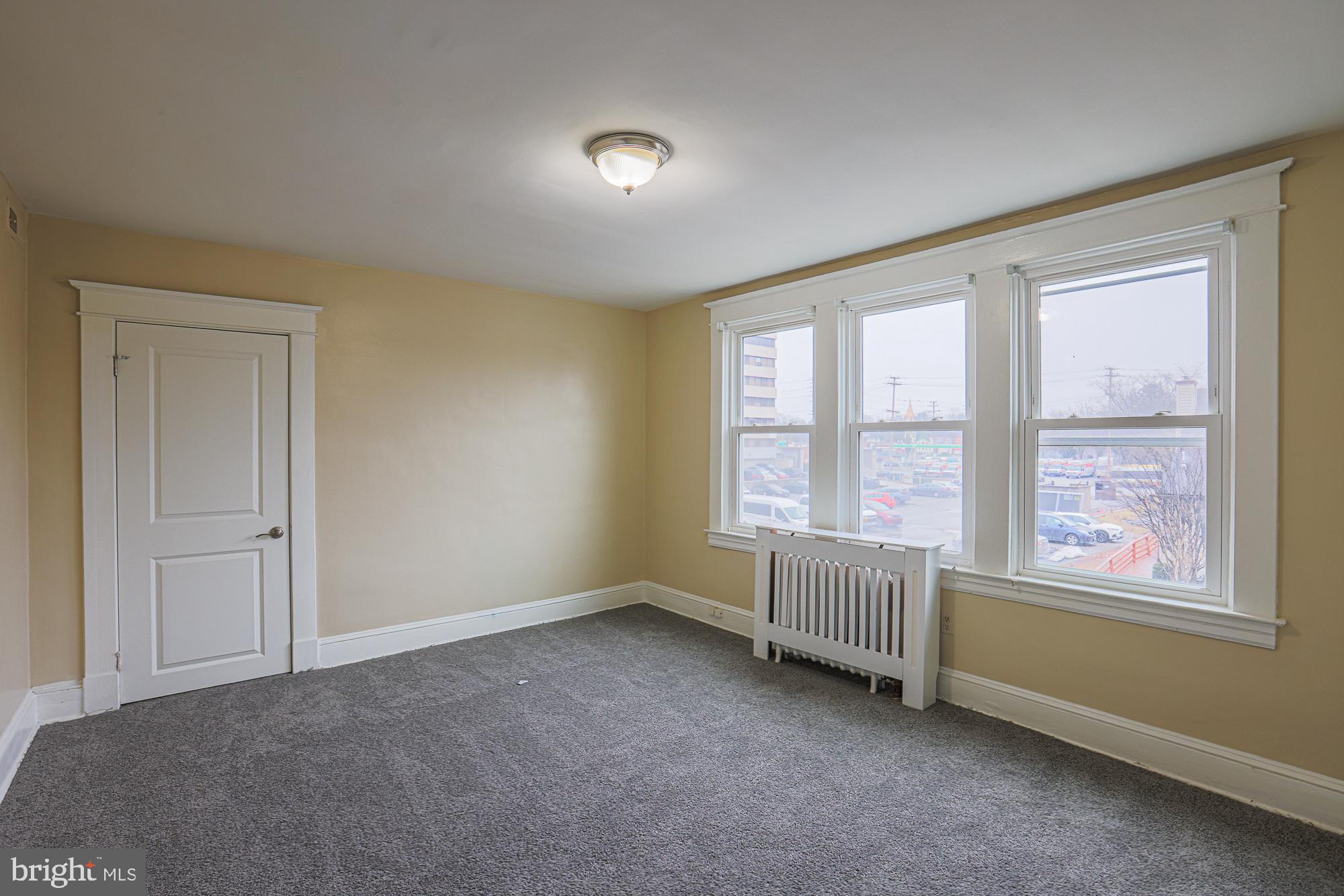 8 Irving Place Baltimore, MD 21208 - Photo 14 of 25 Bright and airy room with classic charm.