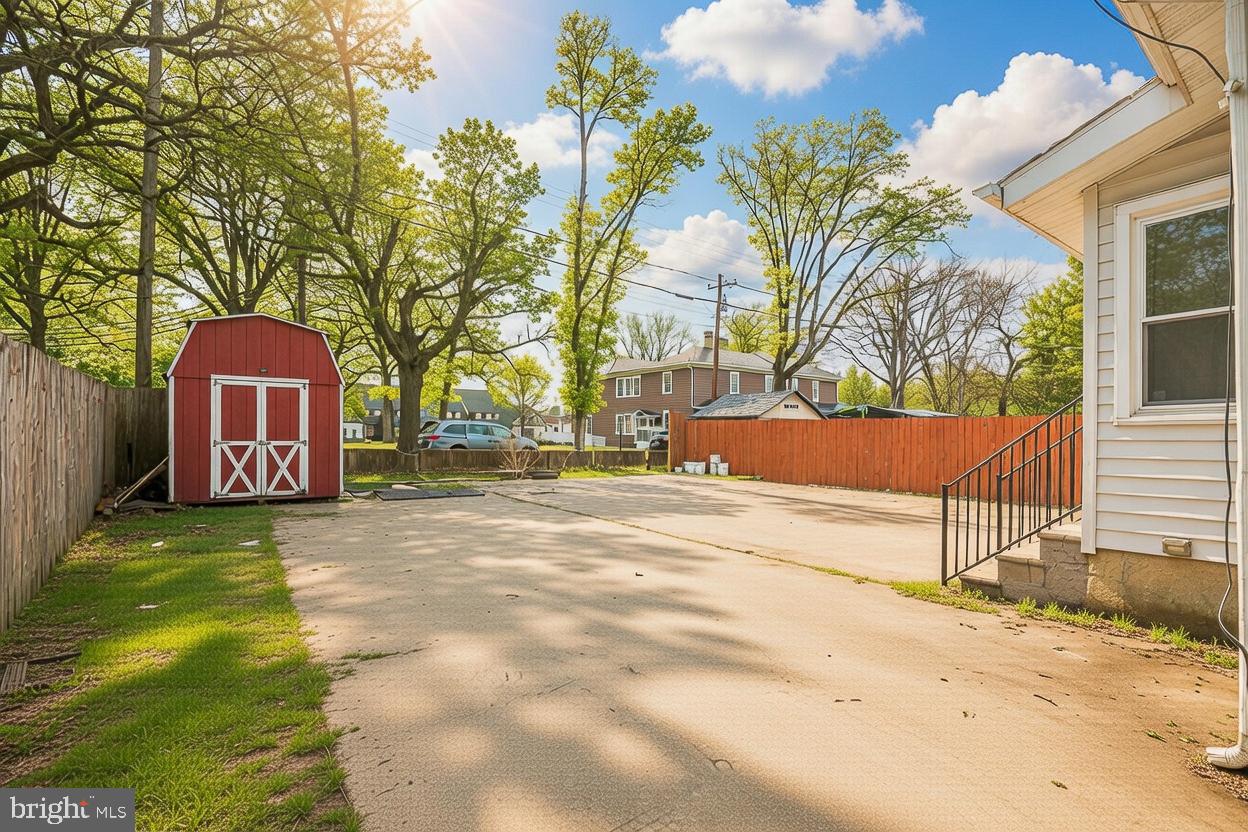 8 Irving Place Baltimore, MD 21208 - Photo 21 of 25 Spacious backyard with charming shed.