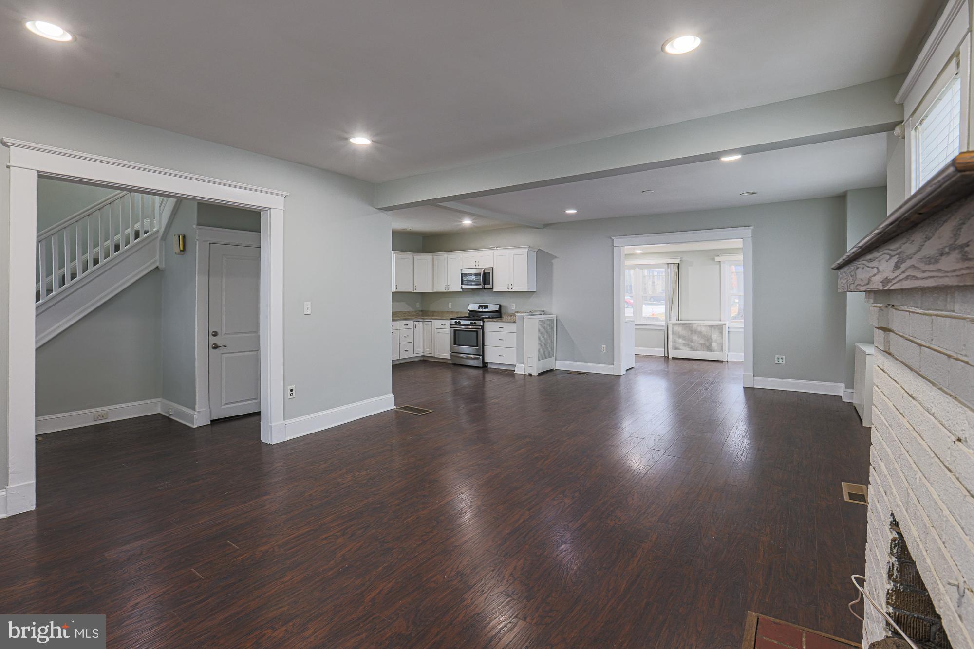 8 Irving Place Baltimore, MD 21208 - Photo 3 of 25 Spacious, modern living area with charm.