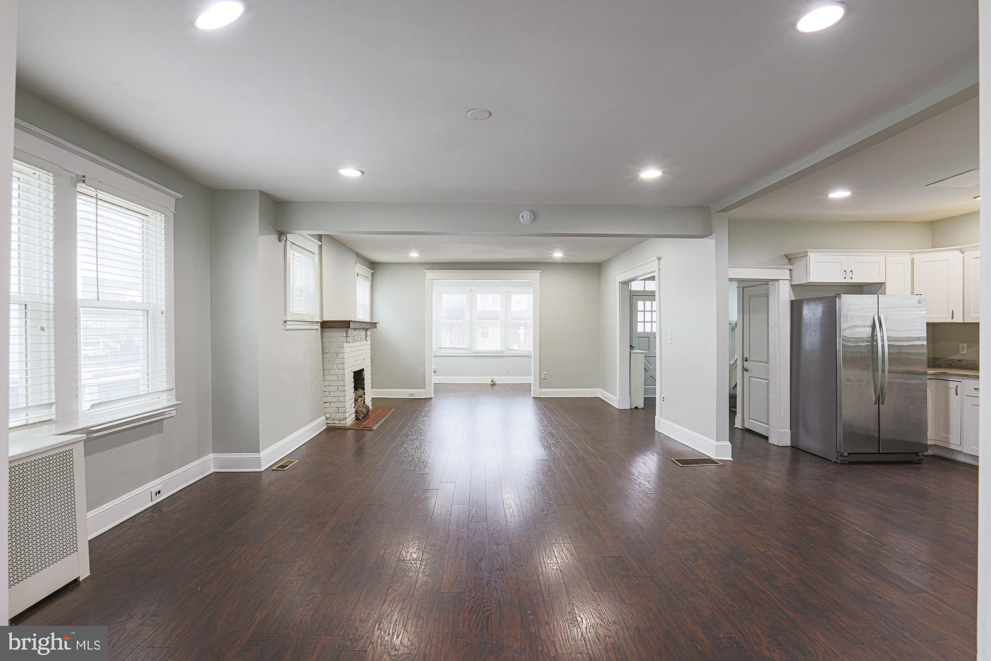 8 Irving Place Baltimore, MD 21208 - Photo 6 of 25 Spacious, light-filled open living area.
